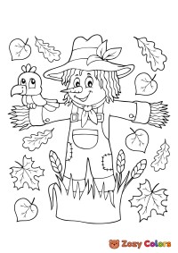 Autumn scarecrow with a crow