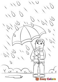 Boy in autumn rain
